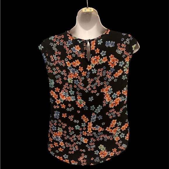Candie’s size small floral tank. Black with vibrant flowers Very gently used. - Picture 10 of 10